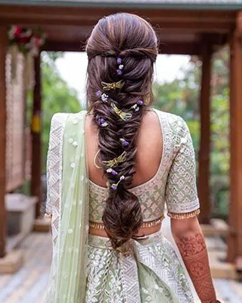 messy fishtail braid hairstyle saree boho